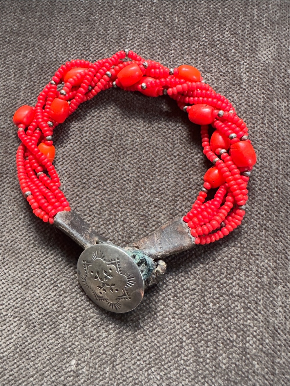 Native American red coral, silver and leather bracelet
